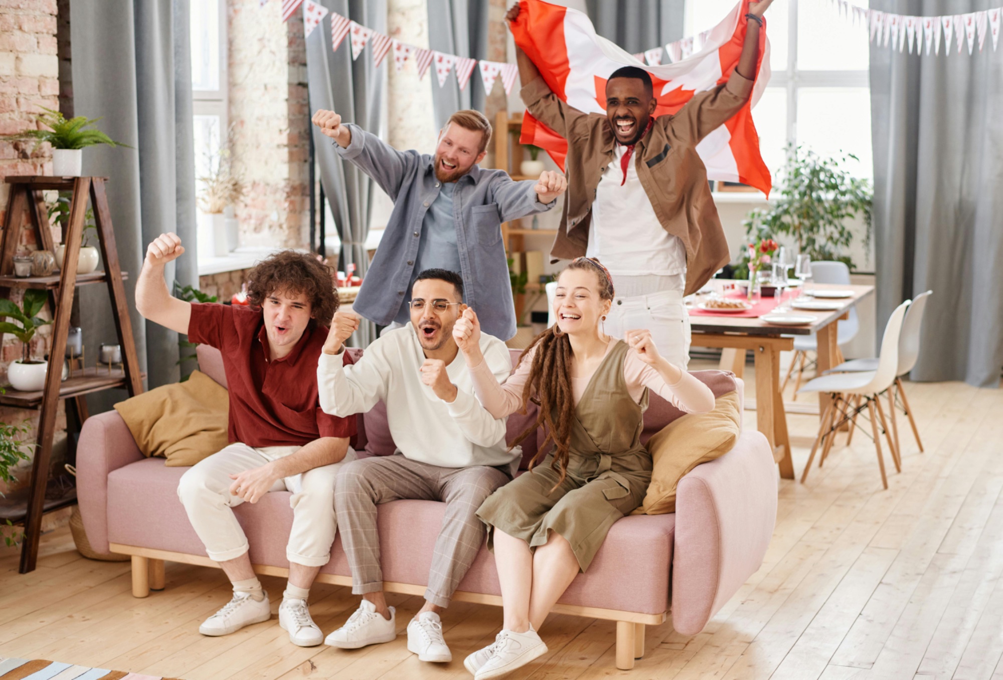 Happy people celebrating Canadian citizenship